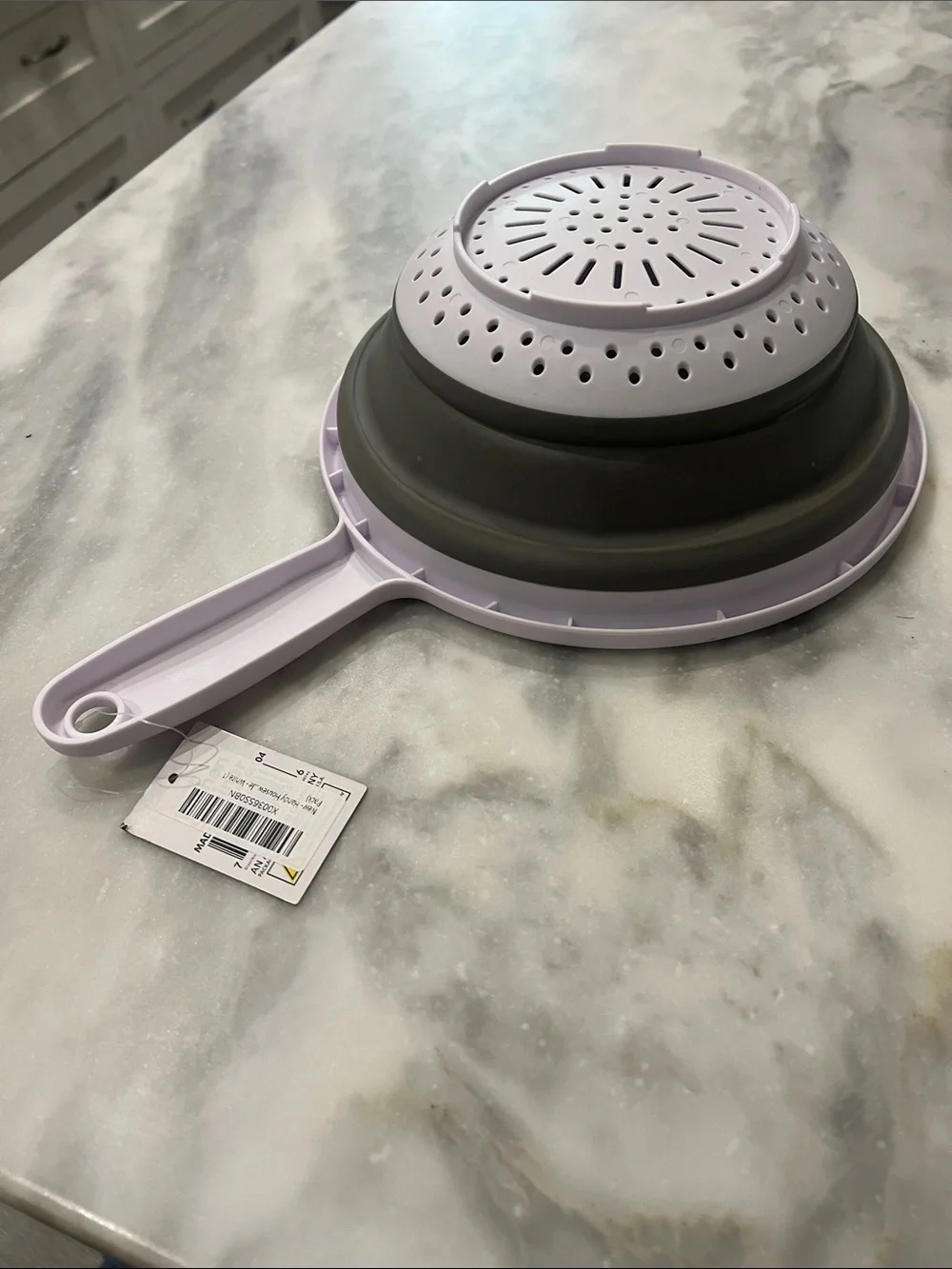 NWT Collapsible strainer with handle